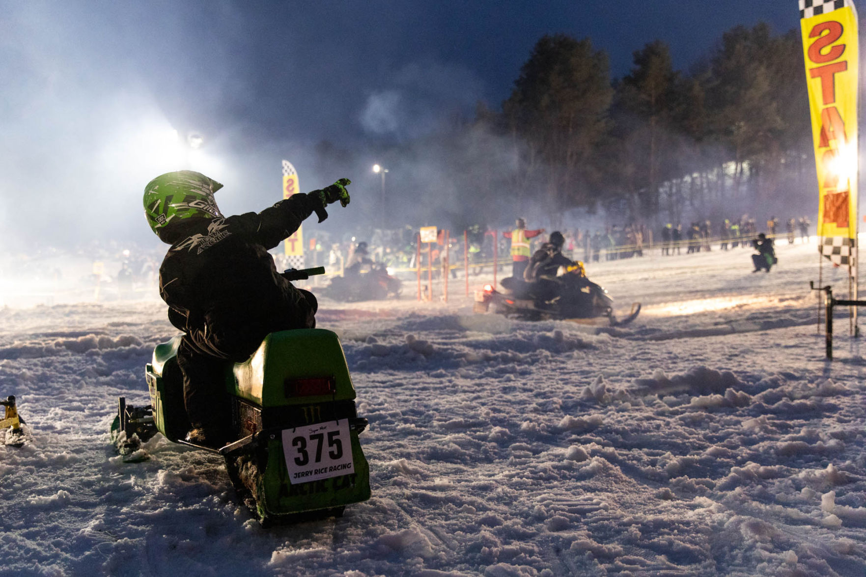 Snowmobile races heat up the night